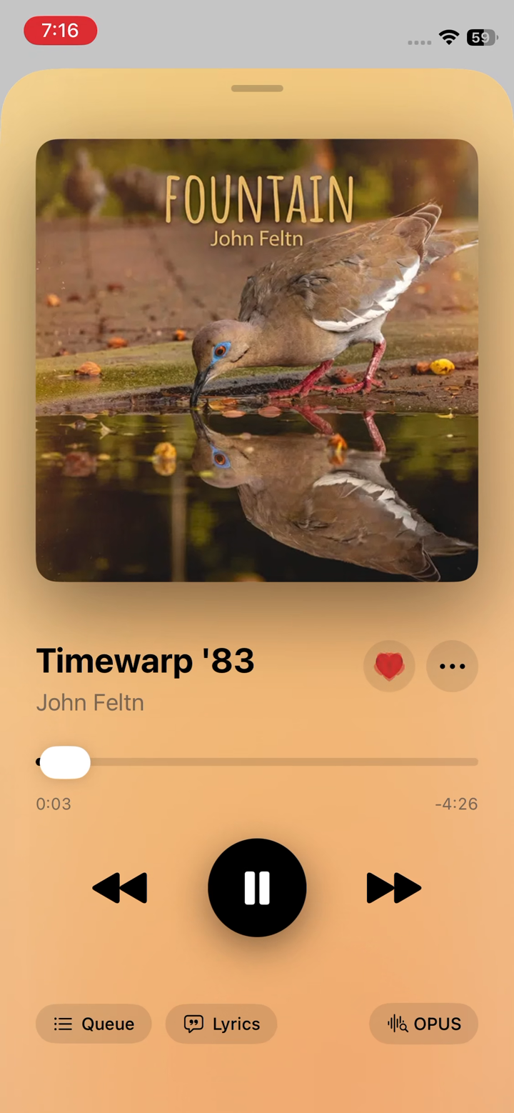 Juliet Now Playing screen with album art, playback controls and Queue, Lyrics and OPUS buttons